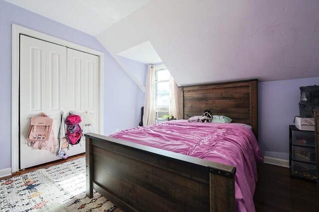93 Bank St, North Attleboro, MA 02760 - bedroom featuring lofted ceiling, a closet, wood finished floors, and baseboards