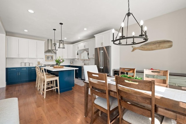 11 Bailey Pond Ln Unit 11, Amesbury, MA 01913 - dining area with a chandelier, dark wood finished floors, and recessed lighting