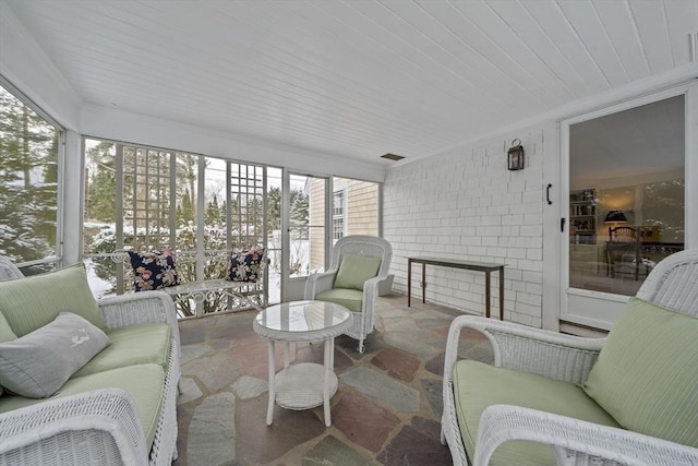 sunroom / solarium with wood ceiling