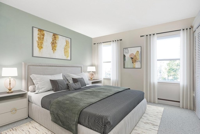 14 Harold St Unit D, Harwich, MA 02646 - bedroom with baseboard heating and light carpet