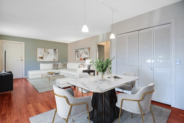 14 Harold St Unit D, Harwich, MA 02646 - dining room with dark wood finished floors and track lighting