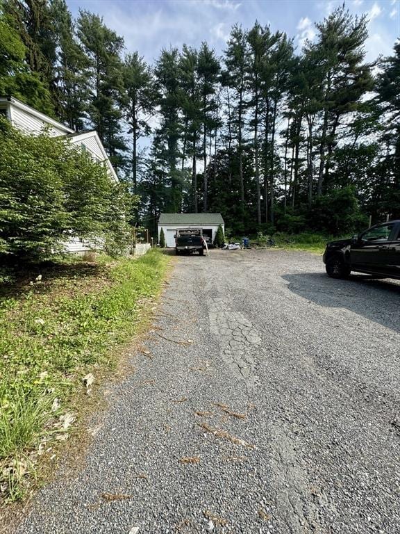45 River St, Belchertown, MA 01007 - view of asphalt driveway with view of scattered trees