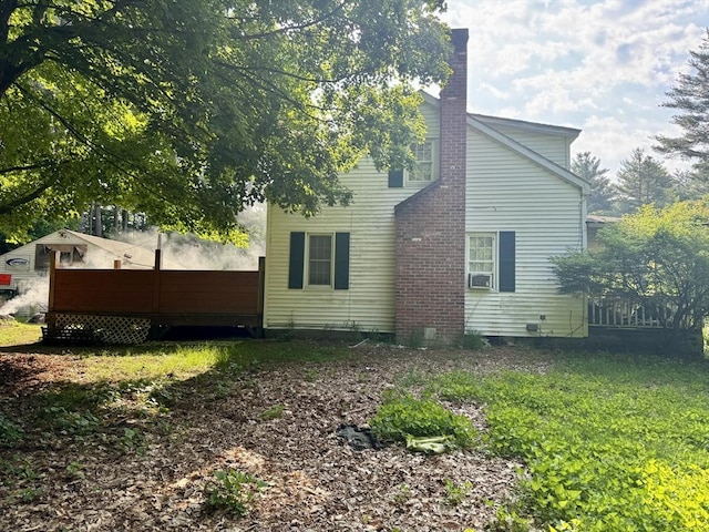 45 River St, Belchertown, MA 01007 - view of side of home with a chimney