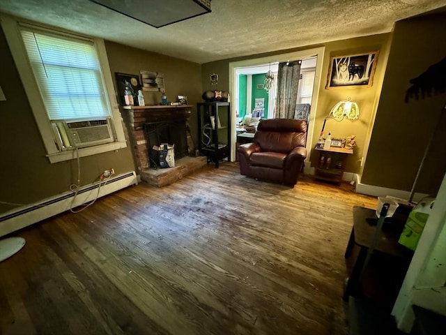 45 River St, Belchertown, MA 01007 - sitting room with cooling unit, wood finished floors, a textured ceiling, and attic access