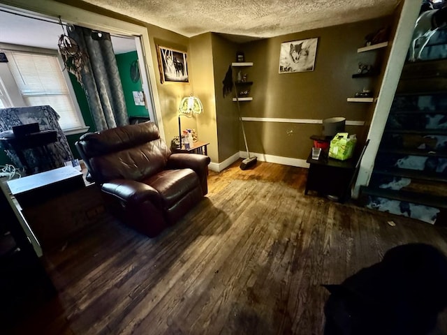 45 River St, Belchertown, MA 01007 - living area with a textured ceiling and wood finished floors