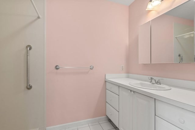 23 William Onthank Ln Unit 23, Southborough, MA 01772 - full bath with vanity, a shower, tile patterned flooring, and baseboards