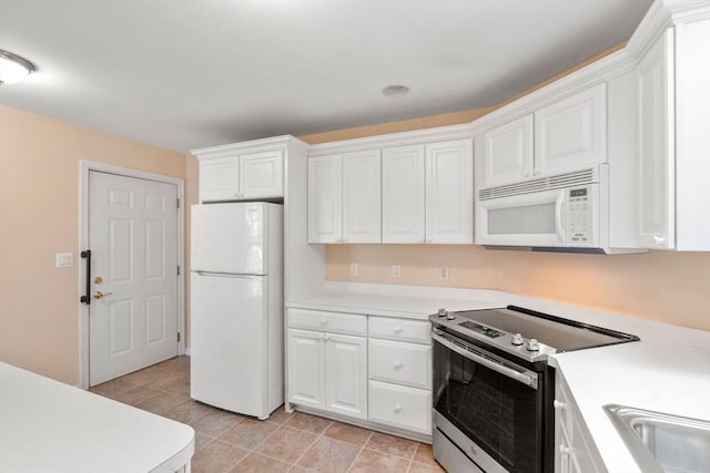23 William Onthank Ln Unit 23, Southborough, MA 01772 - kitchen with white appliances, light countertops, and white cabinets