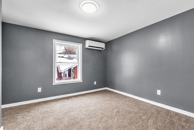 carpeted empty room featuring an AC wall unit and baseboards