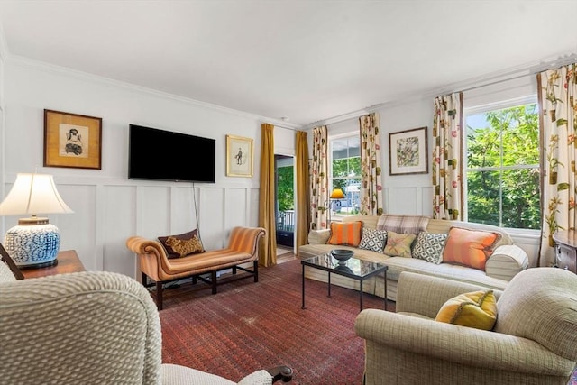 250 Arlington St Unit A, Acton, MA 01720 - living area with crown molding, a decorative wall, wainscoting, and wood finished floors