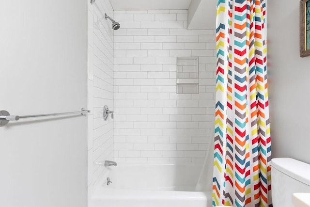 full bath with shower / bath combination with curtain and toilet