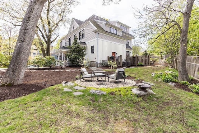 back of house with a patio area