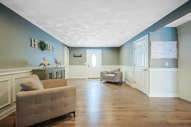 sitting room featuring light hardwood / wood-style flooring