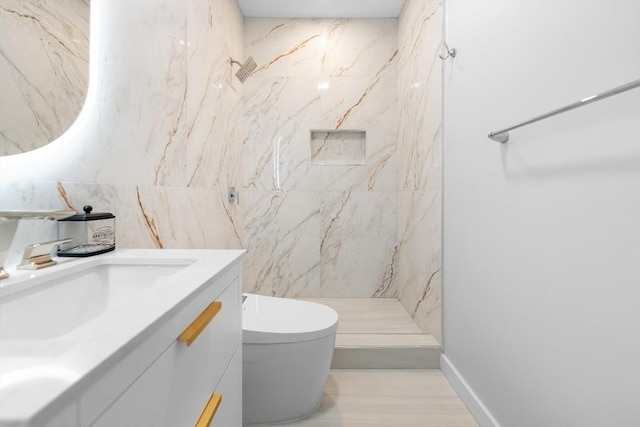 437-439 Chelsea St Unit 3R, Boston, MA 02128 - full bath with a marble finish shower, vanity, and tile walls