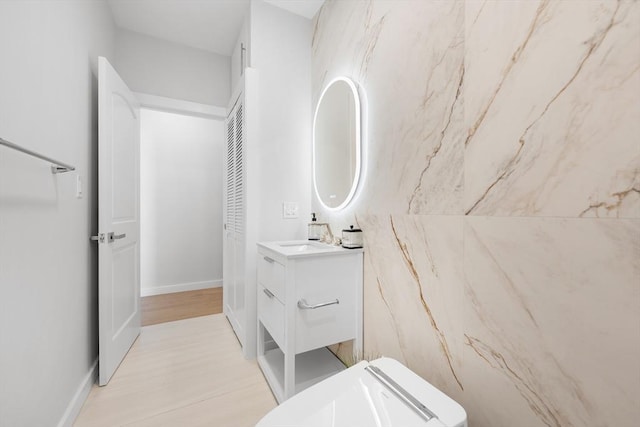 437-439 Chelsea St Unit 3R, Boston, MA 02128 - bathroom with vanity and wood finished floors