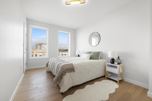 437-439 Chelsea St Unit 3R, Boston, MA 02128 - bedroom featuring baseboards and wood finished floors