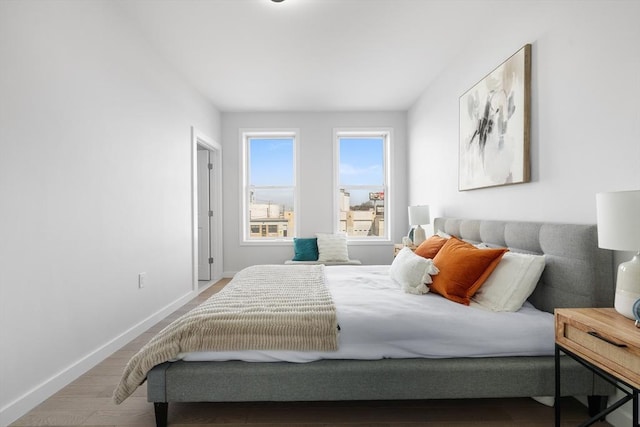 437-439 Chelsea St Unit 3R, Boston, MA 02128 - bedroom featuring baseboards and wood finished floors