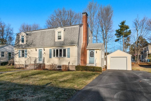 cape cod home with a garage, a front yard, and an outbuilding