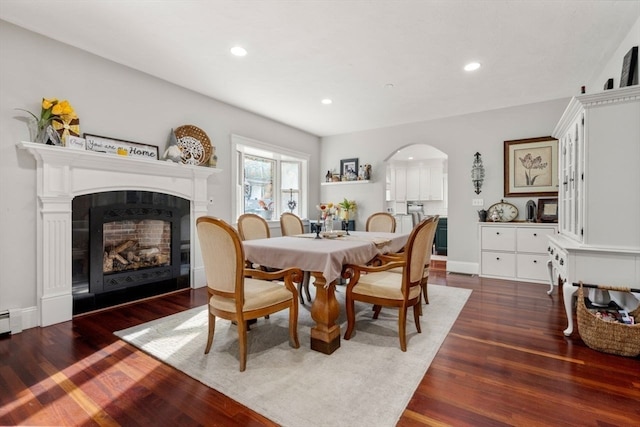 dining space featuring dark hardwood / wood-style flooring