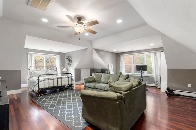 bedroom with ceiling fan, multiple windows, vaulted ceiling, and dark hardwood / wood-style floors