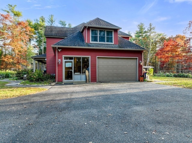 view of front of property featuring a garage