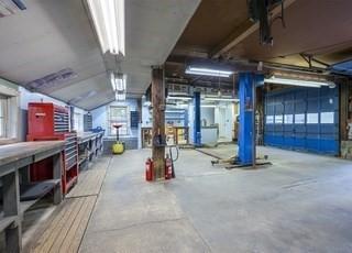 garage with a workshop area