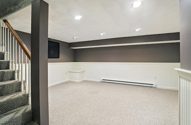 814 Wellman Ave Unit 814, Chelmsford, MA 01863 - finished below grade area with baseboard heating, wainscoting, carpet flooring, stairs, and recessed lighting