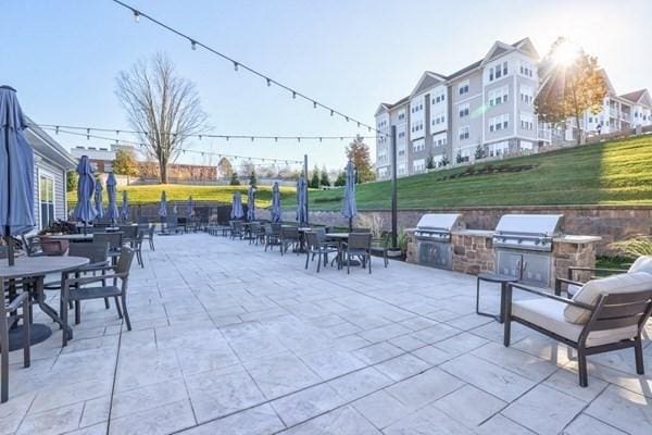 view of patio featuring an outdoor kitchen and grilling area