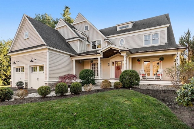 view of front of property featuring covered porch and a front yard