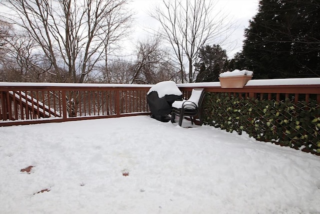 view of snow covered deck