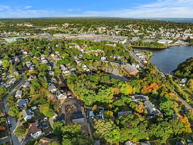 drone / aerial view with a water view