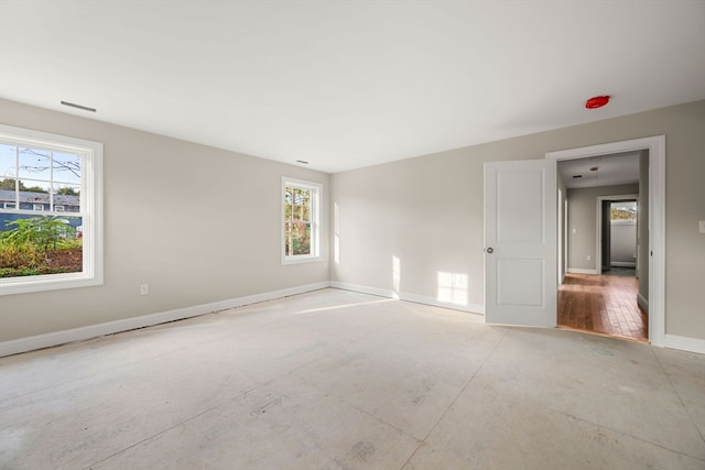 spare room featuring a healthy amount of sunlight