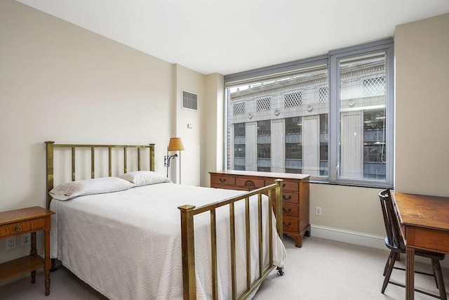 1 Charles St S Unit 602, Boston, MA 02116 - bedroom featuring light carpet and baseboards