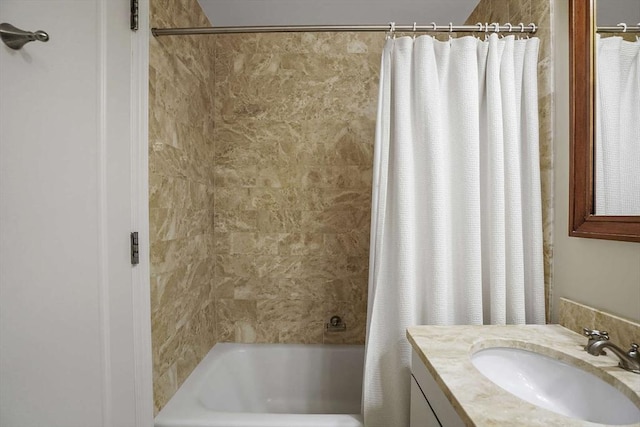 1 Charles St S Unit 602, Boston, MA 02116 - bathroom featuring shower / bathtub combination with curtain and vanity