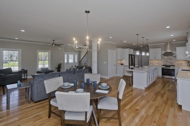 15 Fernwood Dr, East Longmeadow, MA 01028 - dining room with ornamental molding, recessed lighting, light wood finished floors, ceiling fan, and baseboards