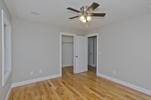 15 Fernwood Dr, East Longmeadow, MA 01028 - unfurnished bedroom featuring light wood finished floors, baseboards, a spacious closet, and a closet