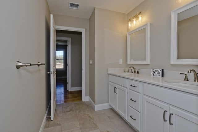 15 Fernwood Dr, East Longmeadow, MA 01028 - bathroom with baseboards and double vanity