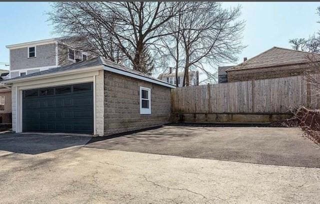 garage featuring fence