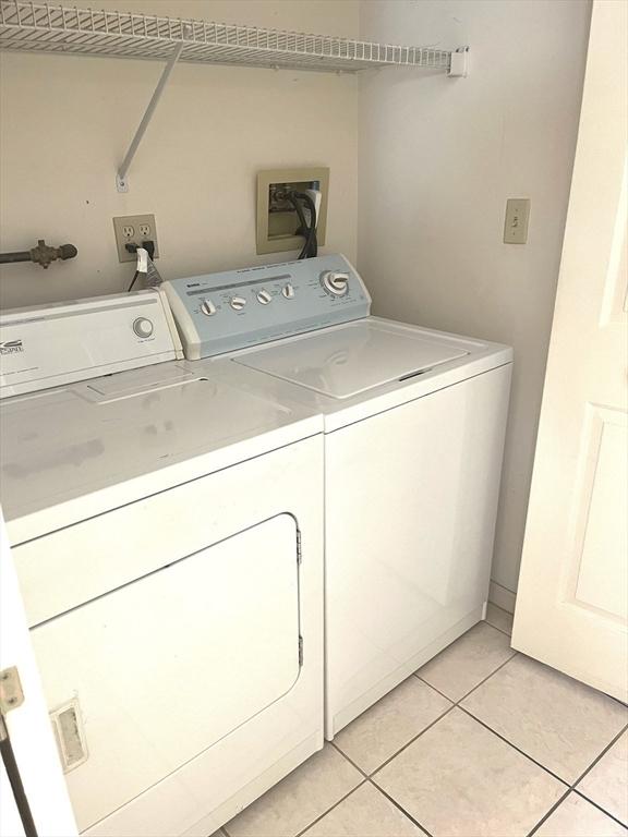 38 Hammond Pl Unit 38, Woburn, MA 01801 - laundry area featuring independent washer and dryer and light tile patterned floors