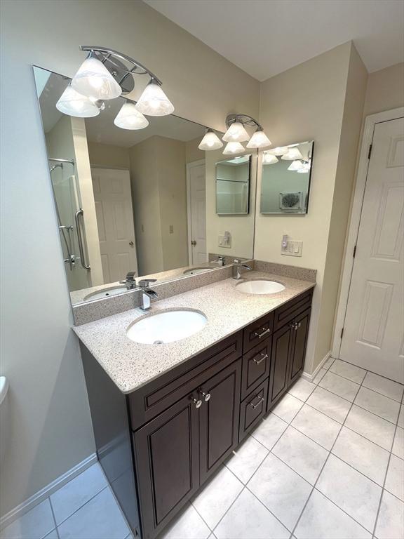 38 Hammond Pl Unit 38, Woburn, MA 01801 - full bath featuring tile patterned floors and double vanity