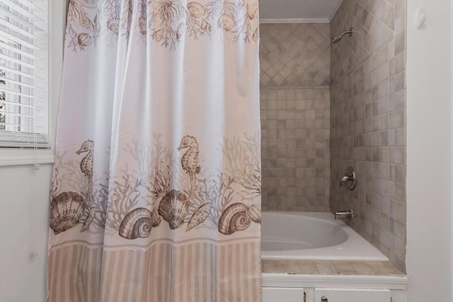 bathroom with shower / bathtub combination with curtain