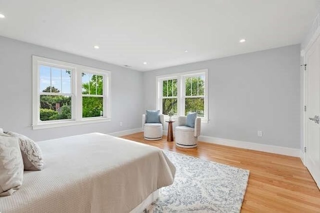 162 Swanton St Unit 162, Winchester, MA 01890 - bedroom with light wood-style floors, baseboards, and recessed lighting