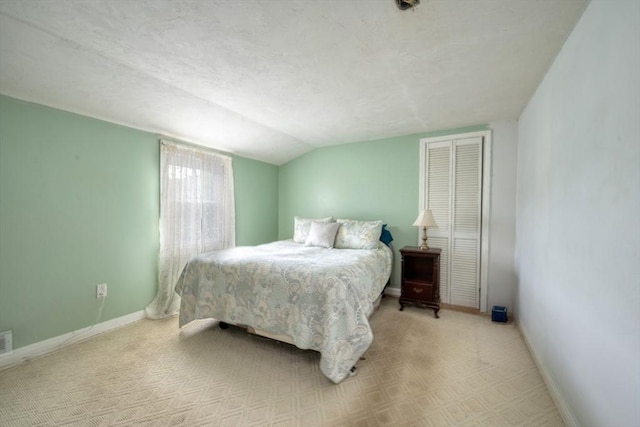 208 Green St, Weymouth, MA 02191 - bedroom with vaulted ceiling, baseboards, carpet, and a closet