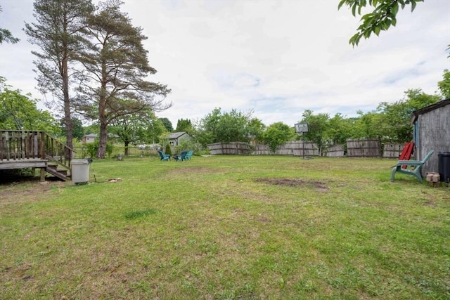 208 Green St, Weymouth, MA 02191 - view of yard featuring a wooden deck and a storage shed