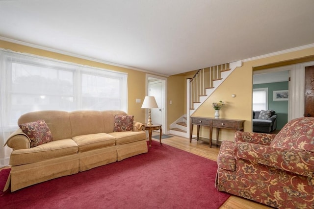 208 Green St, Weymouth, MA 02191 - living room with stairs, healthy amount of natural light, wood finished floors, and ornamental molding