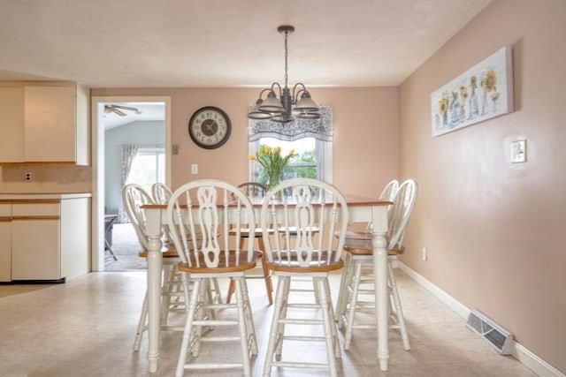 208 Green St, Weymouth, MA 02191 - dining room with a chandelier, baseboards, and a ceiling fan