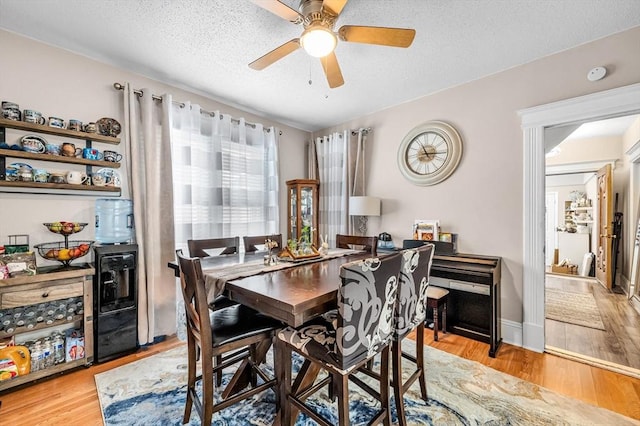 70 Riverdale St, West Springfield, MA 01089 - dining area with ceiling fan, light wood finished floors, and a textured ceiling