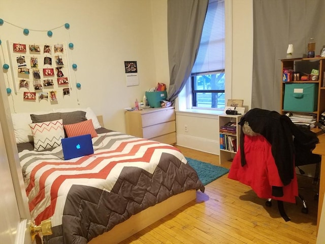 bedroom featuring light hardwood / wood-style floors