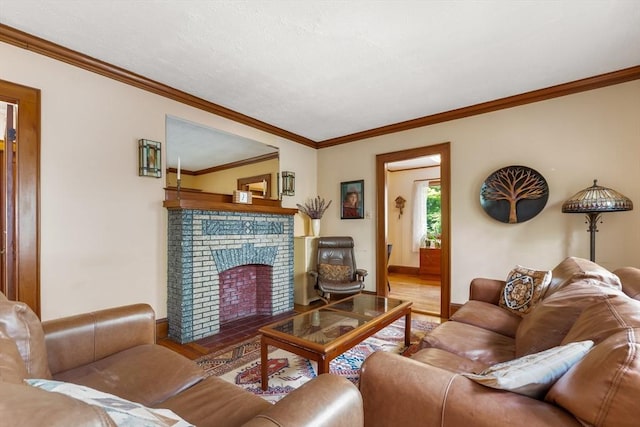 living room with ornamental molding, wood finished floors, and a fireplace