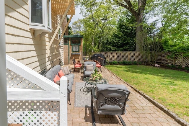 view of patio featuring a grill