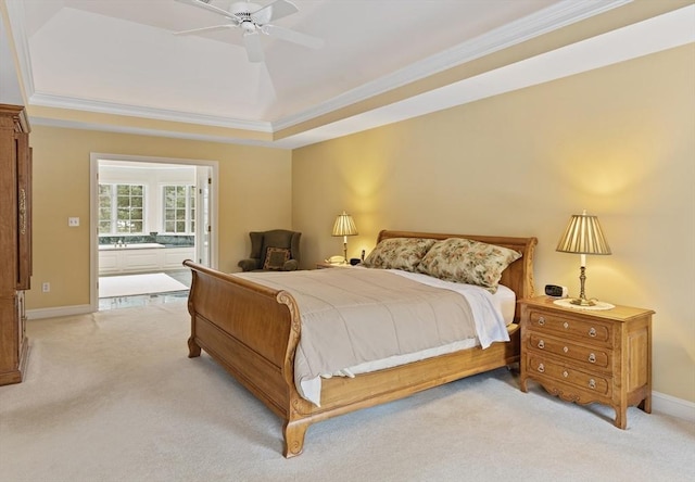 bedroom featuring a raised ceiling, ceiling fan, and crown molding